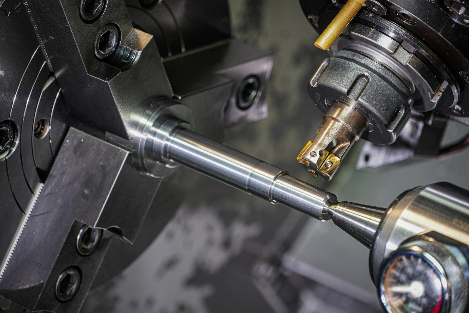 Shaft held in a lathe chuck